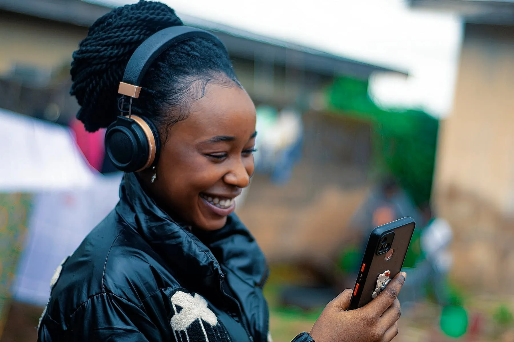 A woman reading a message on her phone